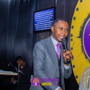 Pastor Temiloluwa Ola preaching