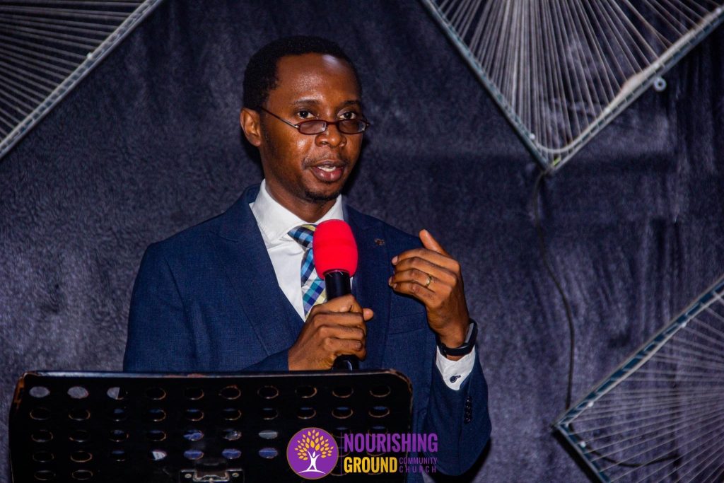 Pastor Temiloluwa Ola preaching